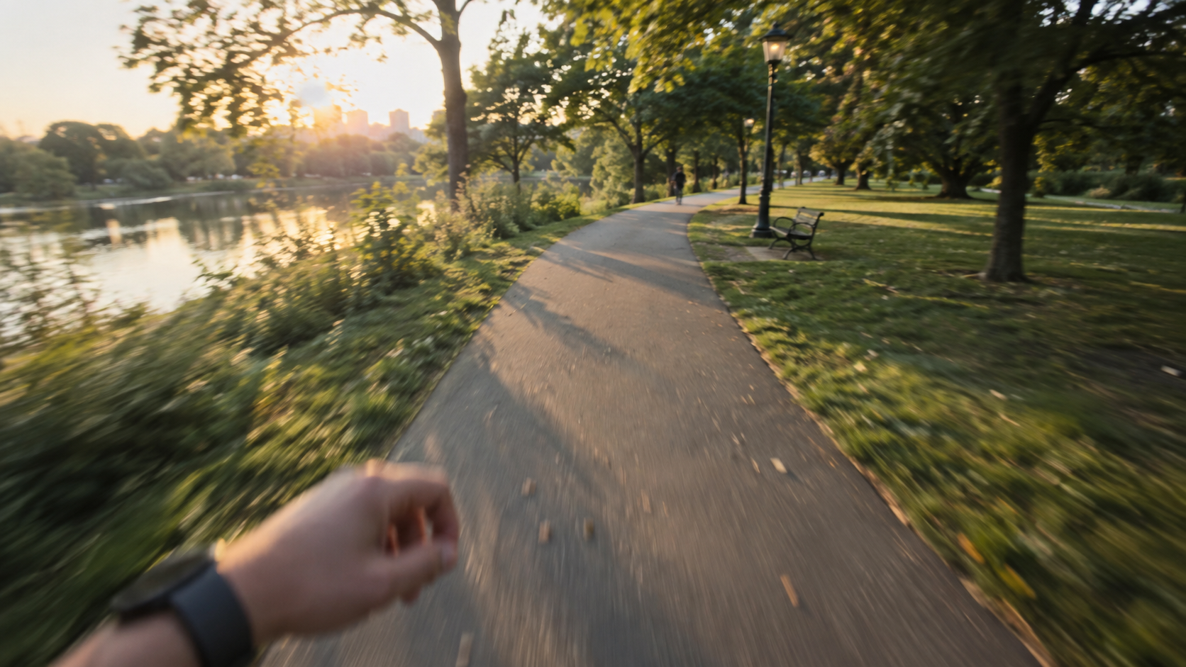 A runner listening to a podcast along a sunlit park path